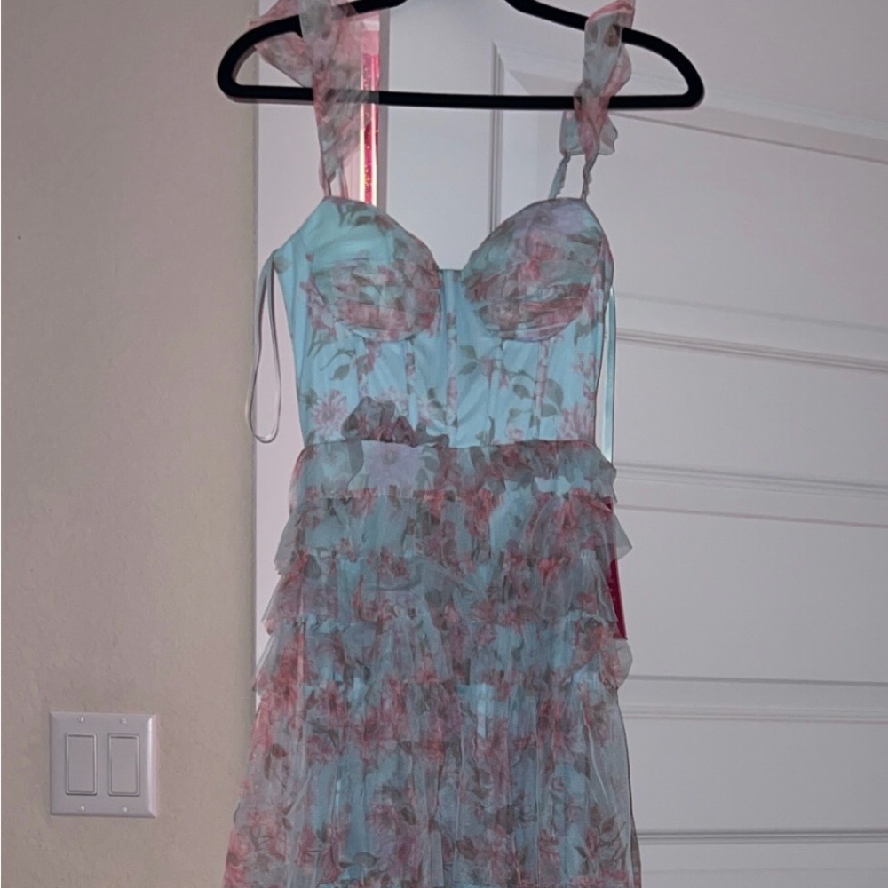 Size 1/2 B. Darlin brand new dress for prom. Light Blue with Pink Floral